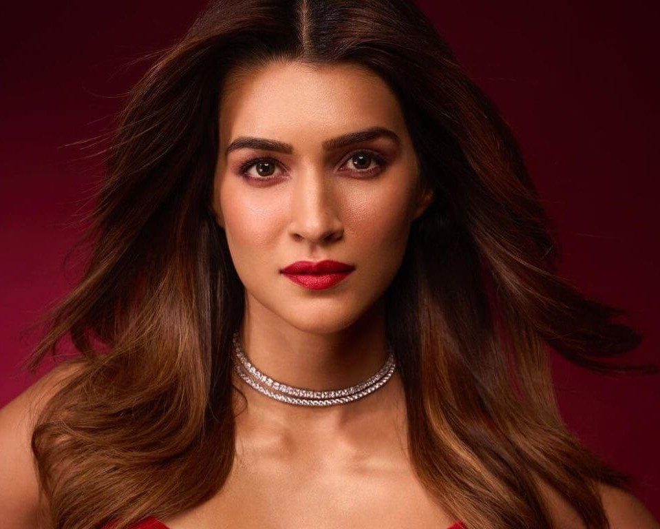 Kriti Sanon, an Indian actress, and model, posing elegantly with a confident smile.