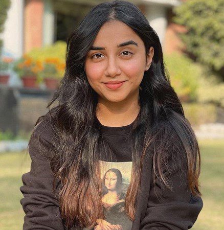 Prajakta Koli, a popular Indian YouTuber, and influencer, smiling and posing for the camera.